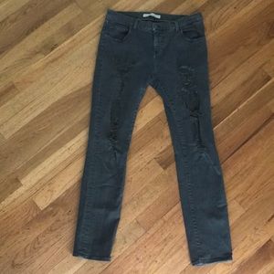 Two women in the world high waist jeans Italy